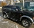 Черный Мицубиси Паджеро Спорт, объемом двигателя 3 л и пробегом 400 тыс. км за 6500 $, фото 5 на Automoto.ua