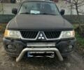 Черный Мицубиси Паджеро Спорт, объемом двигателя 3 л и пробегом 300 тыс. км за 5500 $, фото 1 на Automoto.ua