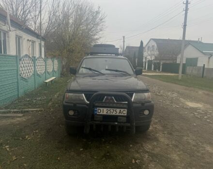 Черный Мицубиси Паджеро Спорт, объемом двигателя 3 л и пробегом 340 тыс. км за 6000 $, фото 1 на Automoto.ua