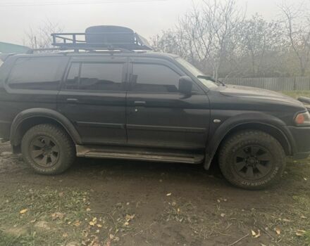 Черный Мицубиси Паджеро Спорт, объемом двигателя 3 л и пробегом 340 тыс. км за 6000 $, фото 2 на Automoto.ua