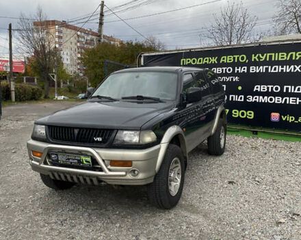 Черный Мицубиси Паджеро Спорт, объемом двигателя 3 л и пробегом 280 тыс. км за 6800 $, фото 1 на Automoto.ua