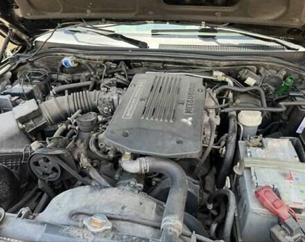 Черный Мицубиси Паджеро Спорт, объемом двигателя 3 л и пробегом 400 тыс. км за 6500 $, фото 10 на Automoto.ua