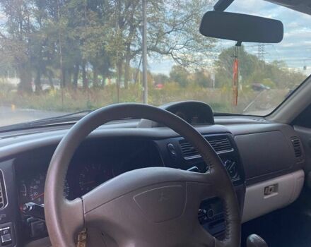 Чорний Міцубісі Паджеро Спорт, об'ємом двигуна 3 л та пробігом 280 тис. км за 4500 $, фото 10 на Automoto.ua