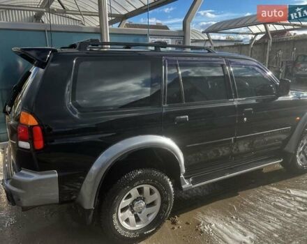 Черный Мицубиси Паджеро Спорт, объемом двигателя 3 л и пробегом 400 тыс. км за 6500 $, фото 3 на Automoto.ua