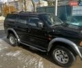 Черный Мицубиси Паджеро Спорт, объемом двигателя 3 л и пробегом 400 тыс. км за 6500 $, фото 4 на Automoto.ua