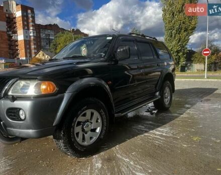 Черный Мицубиси Паджеро Спорт, объемом двигателя 3 л и пробегом 400 тыс. км за 6500 $, фото 1 на Automoto.ua