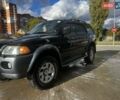 Черный Мицубиси Паджеро Спорт, объемом двигателя 3 л и пробегом 400 тыс. км за 6500 $, фото 1 на Automoto.ua