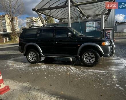 Черный Мицубиси Паджеро Спорт, объемом двигателя 3 л и пробегом 400 тыс. км за 6500 $, фото 2 на Automoto.ua