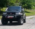 Черный Мицубиси Паджеро Спорт, объемом двигателя 2.97 л и пробегом 280 тыс. км за 11000 $, фото 1 на Automoto.ua
