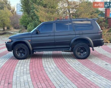 Мицубиси Паджеро Спорт 2001 в Запорожье на Automoto.ua Черный Мицубиси Паджеро Спорт, объемом двигателя 3 л и пробегом 248 тыс. км за 5999 $, фото 4 на Automoto.ua