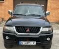 Чорний Міцубісі Паджеро Спорт, об'ємом двигуна 3 л та пробігом 200 тис. км за 5999 $, фото 5 на Automoto.ua