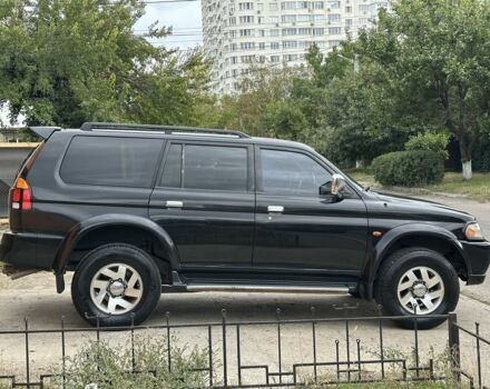 Чорний Міцубісі Паджеро Спорт, об'ємом двигуна 3 л та пробігом 200 тис. км за 5999 $, фото 3 на Automoto.ua