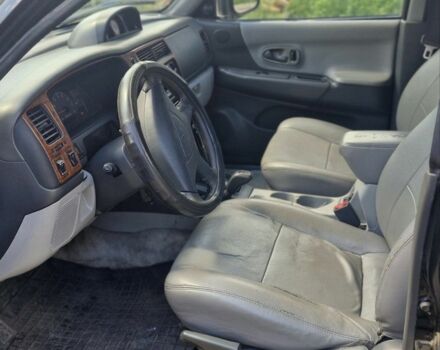 Чорний Міцубісі Паджеро Спорт, об'ємом двигуна 3 л та пробігом 278 тис. км за 6200 $, фото 5 на Automoto.ua