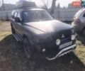 Чорний Міцубісі Паджеро Спорт, об'ємом двигуна 3 л та пробігом 361 тис. км за 5000 $, фото 1 на Automoto.ua