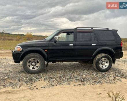 Мицубиси Паджеро Спорт 2002 в Украинке на Automoto.ua Черный Мицубиси Паджеро Спорт, объемом двигателя 2.97 л и пробегом 270 тыс. км за 7000 $, фото 2 на Automoto.ua