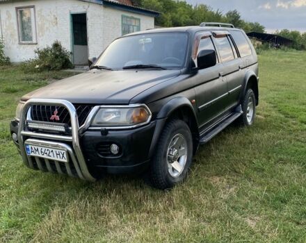 Черный Мицубиси Паджеро Спорт, объемом двигателя 3 л и пробегом 350 тыс. км за 6150 $, фото 1 на Automoto.ua