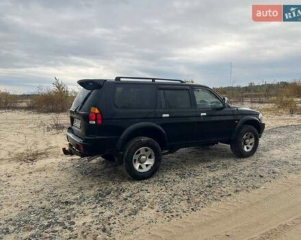 Мицубиси Паджеро Спорт 2002 в Украинке на Automoto.ua Черный Мицубиси Паджеро Спорт, объемом двигателя 2.97 л и пробегом 270 тыс. км за 7000 $, фото 7 на Automoto.ua