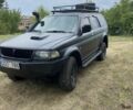 Мицубиси Паджеро Спорт 2002 в Тальном на Automoto.ua Черный Мицубиси Паджеро Спорт, объемом двигателя 2.5 л и пробегом 200 тыс. км за 3600 $, фото 2 на Automoto.ua
