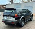 Чорний Міцубісі Паджеро Спорт, об'ємом двигуна 3 л та пробігом 270 тис. км за 6200 $, фото 3 на Automoto.ua