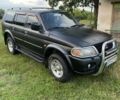 Черный Мицубиси Паджеро Спорт, объемом двигателя 3 л и пробегом 350 тыс. км за 6150 $, фото 2 на Automoto.ua