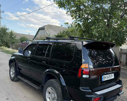 Черный Мицубиси Паджеро Спорт, объемом двигателя 3 л и пробегом 275 тыс. км за 6600 $, фото 2 на Automoto.ua