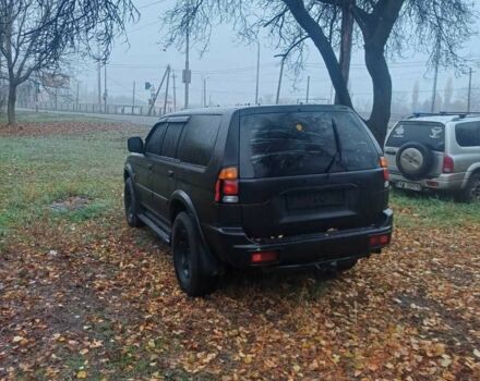 Чорний Міцубісі Паджеро Спорт, об'ємом двигуна 0 л та пробігом 400 тис. км за 4057 $, фото 4 на Automoto.ua