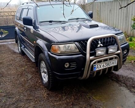 Чорний Міцубісі Паджеро Спорт, об'ємом двигуна 2.5 л та пробігом 207 тис. км за 7000 $, фото 1 на Automoto.ua