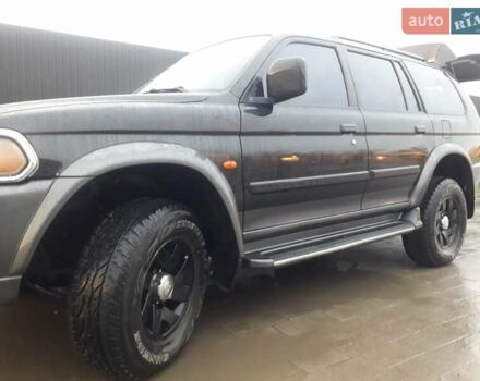 Черный Мицубиси Паджеро Спорт, объемом двигателя 2.97 л и пробегом 290 тыс. км за 9500 $, фото 2 на Automoto.ua