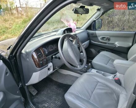 Чорний Міцубісі Паджеро Спорт, об'ємом двигуна 2.97 л та пробігом 126 тис. км за 10500 $, фото 8 на Automoto.ua