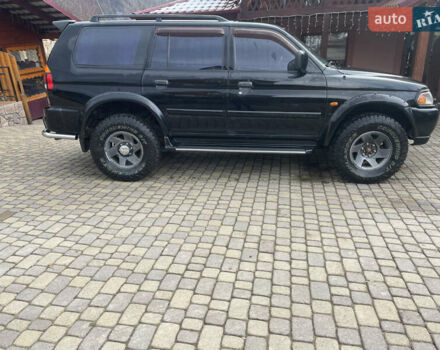 Черный Мицубиси Паджеро Спорт, объемом двигателя 3 л и пробегом 305 тыс. км за 7200 $, фото 7 на Automoto.ua