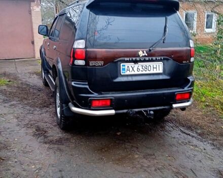 Чорний Міцубісі Паджеро Спорт, об'ємом двигуна 2.5 л та пробігом 207 тис. км за 7000 $, фото 2 на Automoto.ua