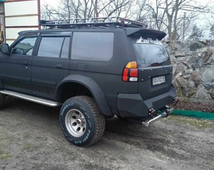 Чорний Міцубісі Паджеро Спорт, об'ємом двигуна 3 л та пробігом 399 тис. км за 15500 $, фото 4 на Automoto.ua