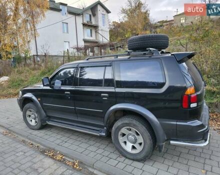 Чорний Міцубісі Паджеро Спорт, об'ємом двигуна 2.97 л та пробігом 126 тис. км за 10500 $, фото 3 на Automoto.ua