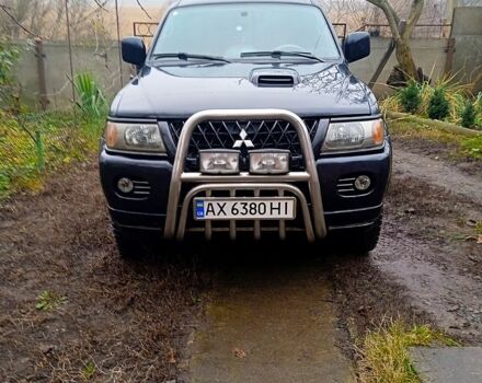 Чорний Міцубісі Паджеро Спорт, об'ємом двигуна 2.5 л та пробігом 207 тис. км за 7000 $, фото 3 на Automoto.ua