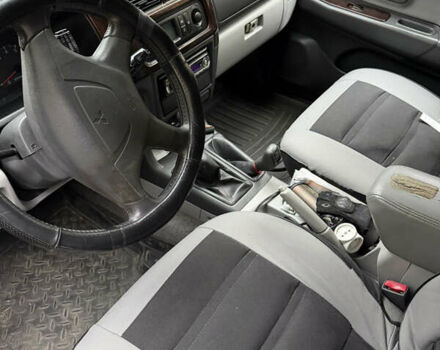 Черный Мицубиси Паджеро Спорт, объемом двигателя 2.97 л и пробегом 290 тыс. км за 7200 $, фото 4 на Automoto.ua