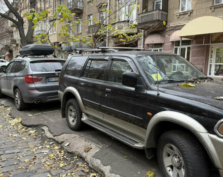 Черный Мицубиси Паджеро Спорт, объемом двигателя 2.97 л и пробегом 290 тыс. км за 7200 $, фото 1 на Automoto.ua