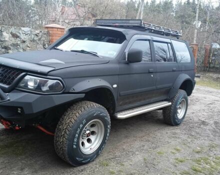 Чорний Міцубісі Паджеро Спорт, об'ємом двигуна 3 л та пробігом 399 тис. км за 15500 $, фото 3 на Automoto.ua