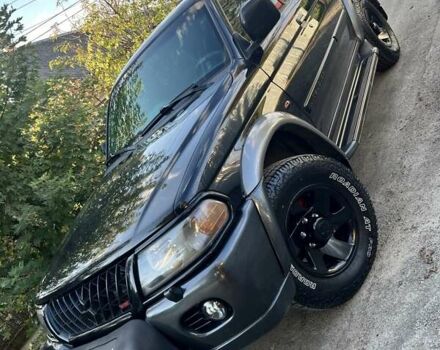 Черный Мицубиси Паджеро Спорт, объемом двигателя 3 л и пробегом 430 тыс. км за 9777 $, фото 1 на Automoto.ua