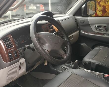 Черный Мицубиси Паджеро Спорт, объемом двигателя 3 л и пробегом 300 тыс. км за 7500 $, фото 7 на Automoto.ua