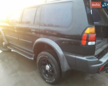 Черный Мицубиси Паджеро Спорт, объемом двигателя 2.97 л и пробегом 290 тыс. км за 9500 $, фото 3 на Automoto.ua