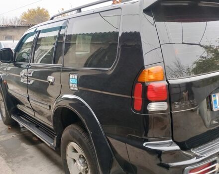 Черный Мицубиси Паджеро Спорт, объемом двигателя 3 л и пробегом 300 тыс. км за 7500 $, фото 4 на Automoto.ua