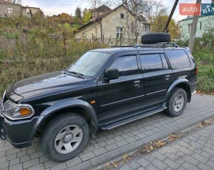 Чорний Міцубісі Паджеро Спорт, об'ємом двигуна 2.97 л та пробігом 126 тис. км за 10500 $, фото 4 на Automoto.ua