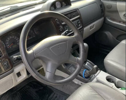 Черный Мицубиси Паджеро Спорт, объемом двигателя 3 л и пробегом 305 тыс. км за 7200 $, фото 8 на Automoto.ua