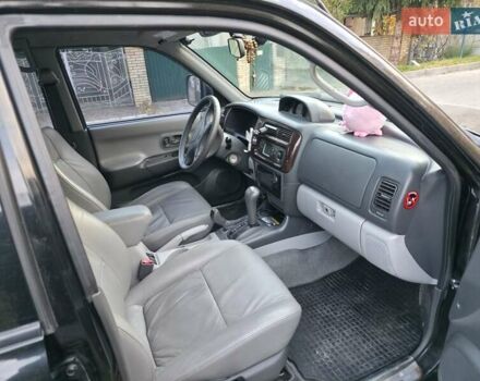 Чорний Міцубісі Паджеро Спорт, об'ємом двигуна 2.97 л та пробігом 126 тис. км за 10500 $, фото 9 на Automoto.ua