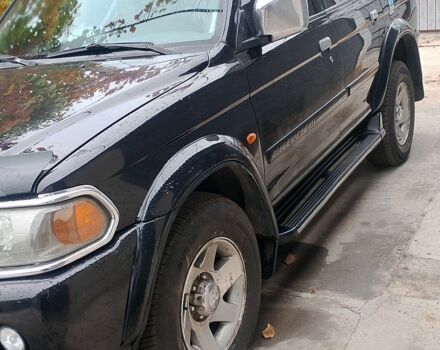 Черный Мицубиси Паджеро Спорт, объемом двигателя 3 л и пробегом 300 тыс. км за 7500 $, фото 1 на Automoto.ua