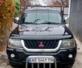 Черный Мицубиси Паджеро Спорт, объемом двигателя 3 л и пробегом 300 тыс. км за 7500 $, фото 1 на Automoto.ua