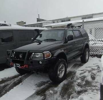 Черный Мицубиси Паджеро Спорт, объемом двигателя 3 л и пробегом 370 тыс. км за 10500 $, фото 5 на Automoto.ua
