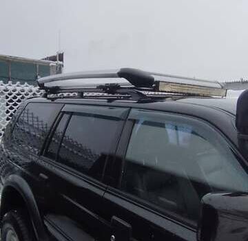 Черный Мицубиси Паджеро Спорт, объемом двигателя 3 л и пробегом 370 тыс. км за 10500 $, фото 4 на Automoto.ua