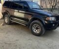 Чорний Міцубісі Паджеро Спорт, об'ємом двигуна 3 л та пробігом 313 тис. км за 6900 $, фото 4 на Automoto.ua