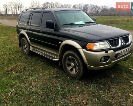 Черный Мицубиси Паджеро Спорт, объемом двигателя 3 л и пробегом 383 тыс. км за 7000 $, фото 2 на Automoto.ua